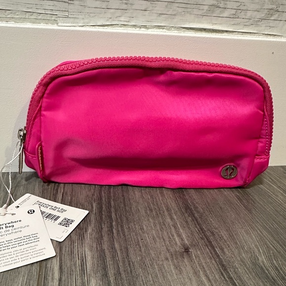 lululemon athletica Handbags - Lululemon everyday belt bag 1L bright pink